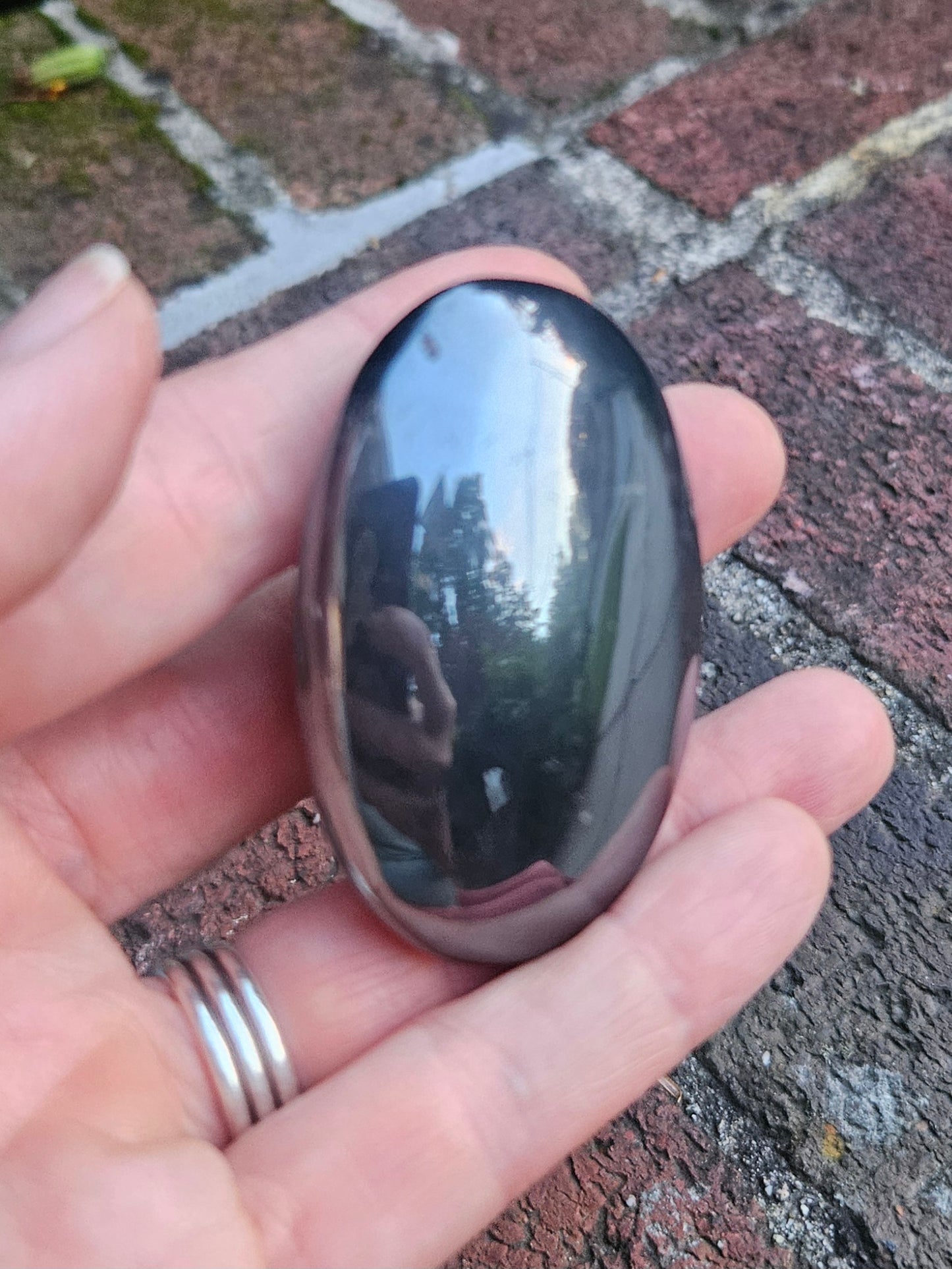 Hematite palm stone