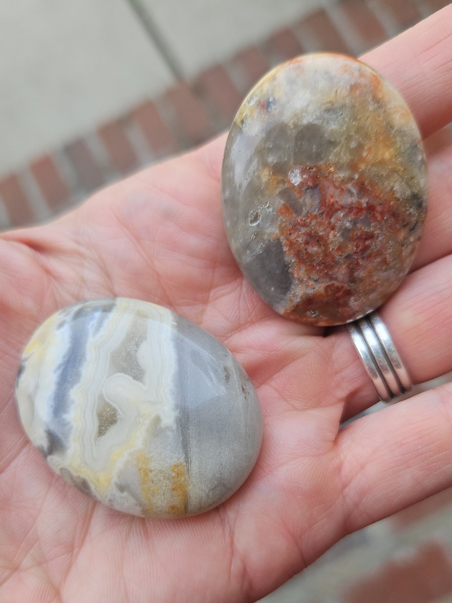 Banded agate palm stones