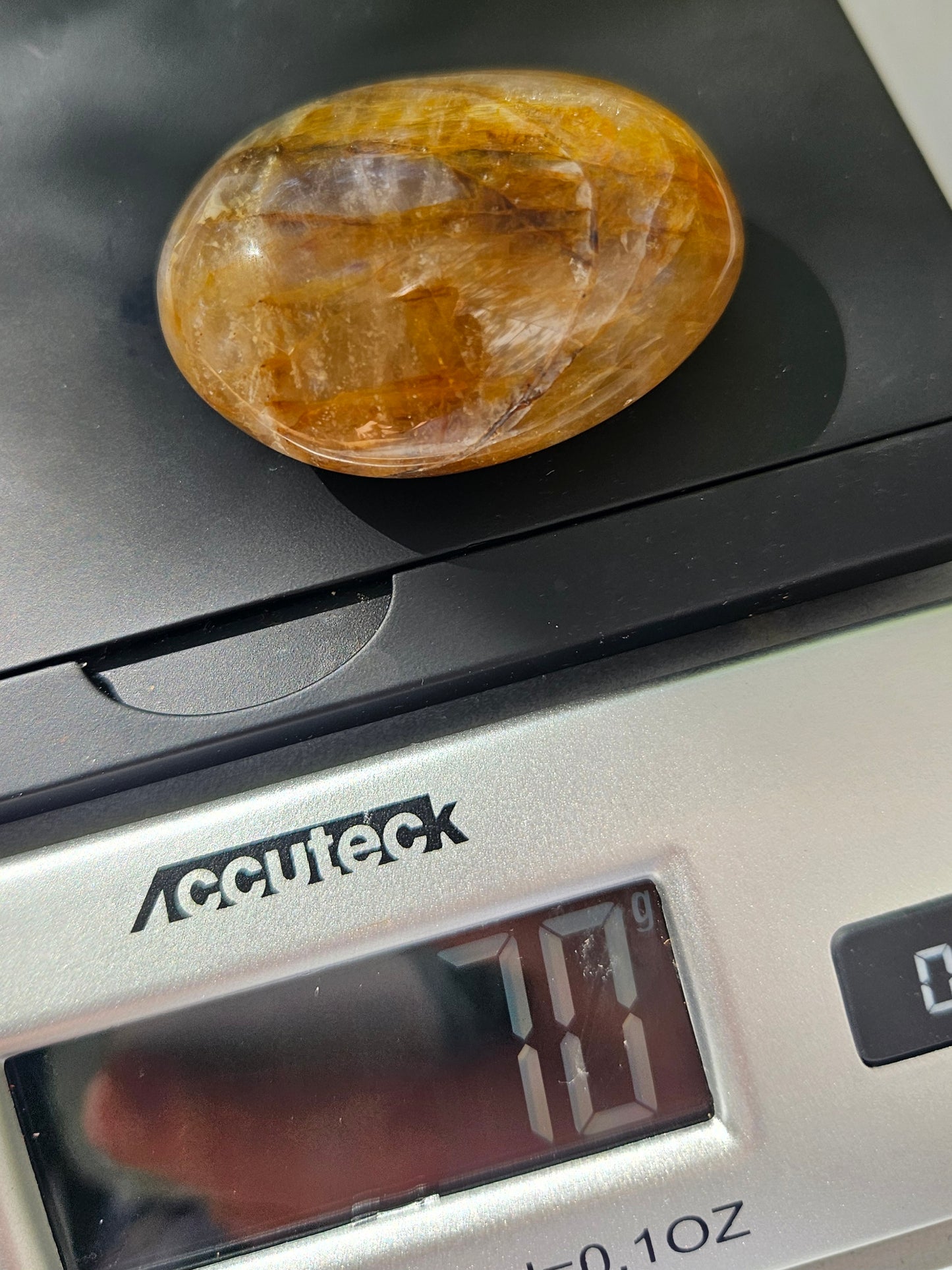 Golden Healer palm stone