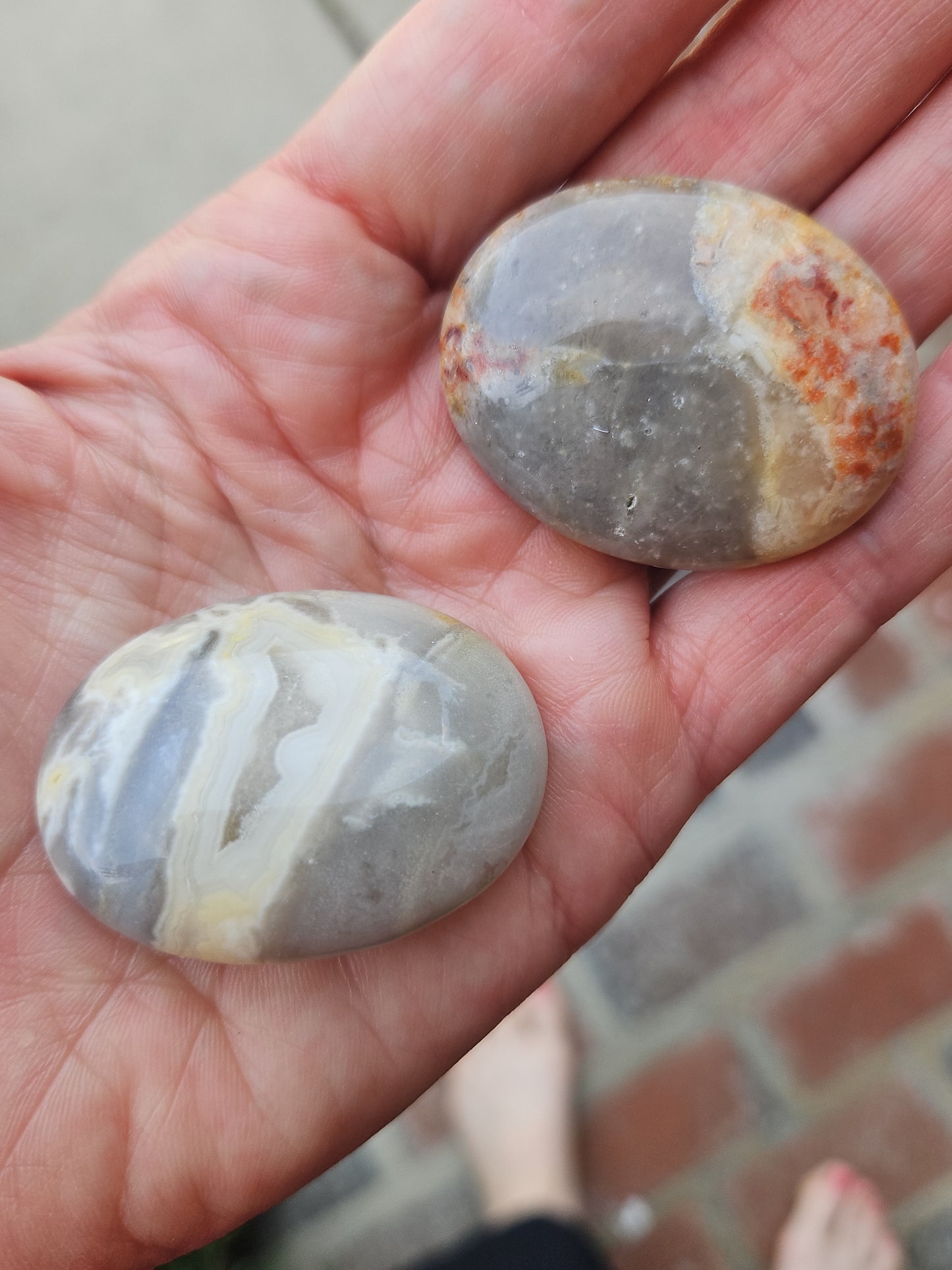 Banded agate palm stones